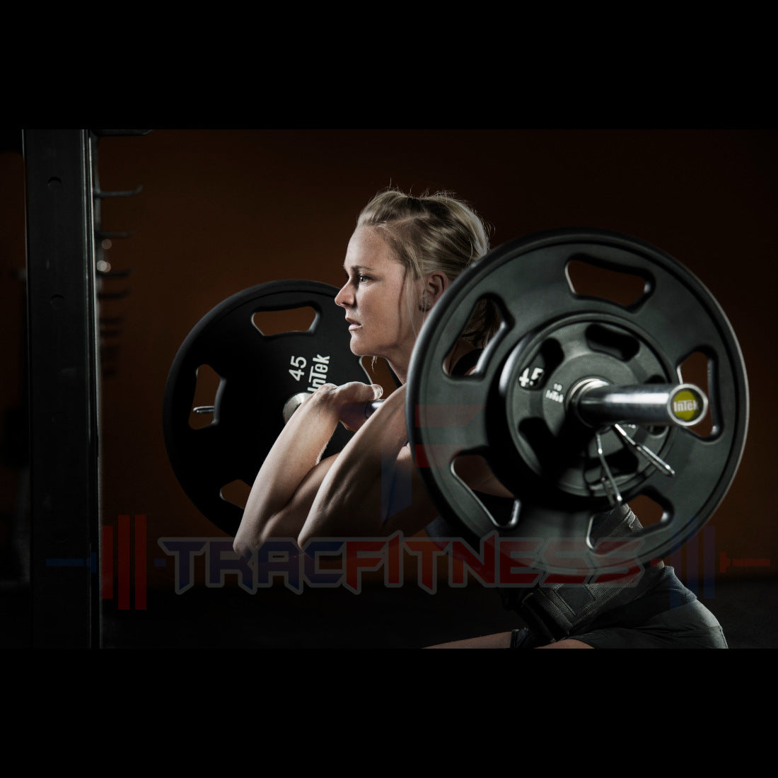 Intek 15kg Woman's Power Bar in Action with Intek Weights