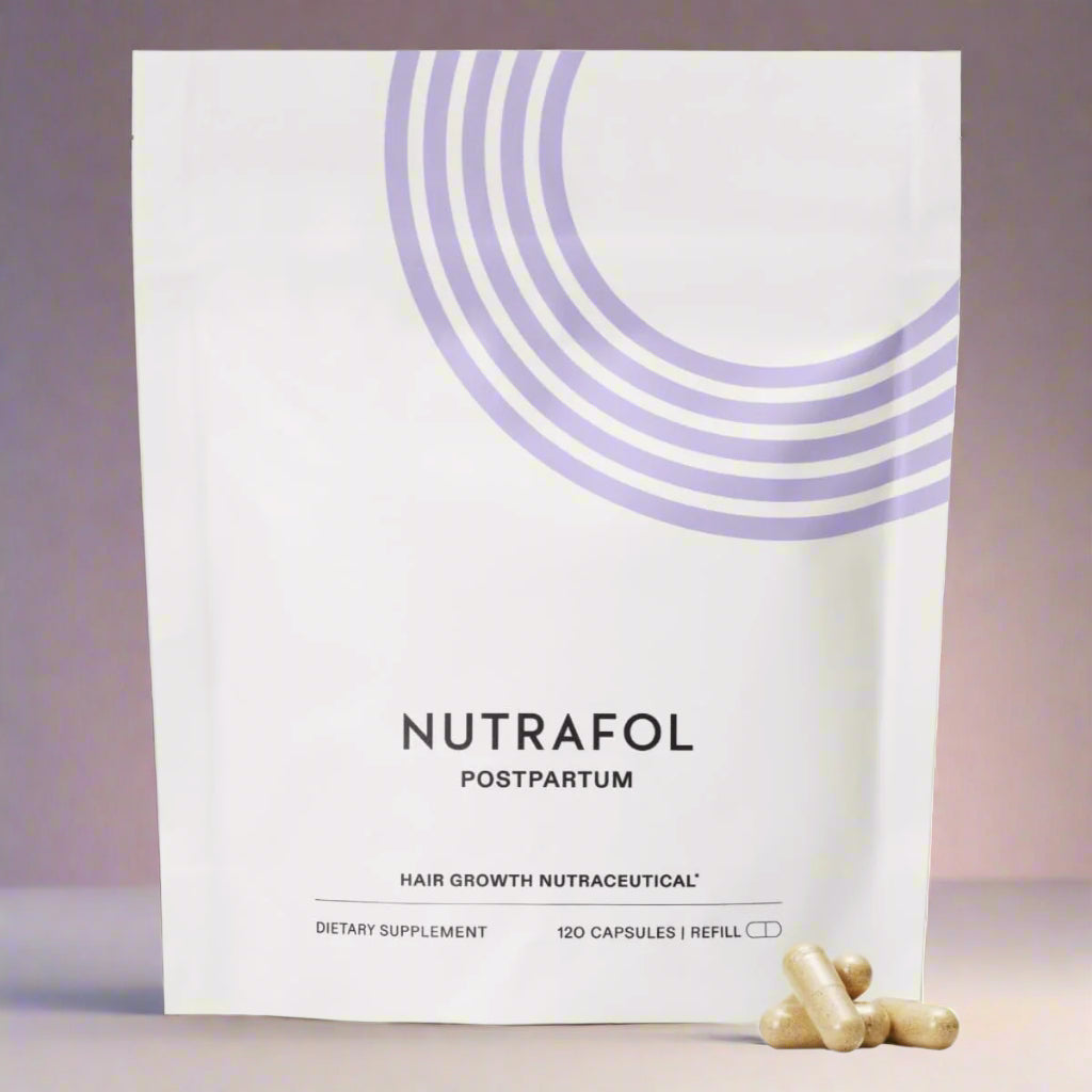 Nutrafol Postpartum hair growth supplement packaging with capsules on a white background