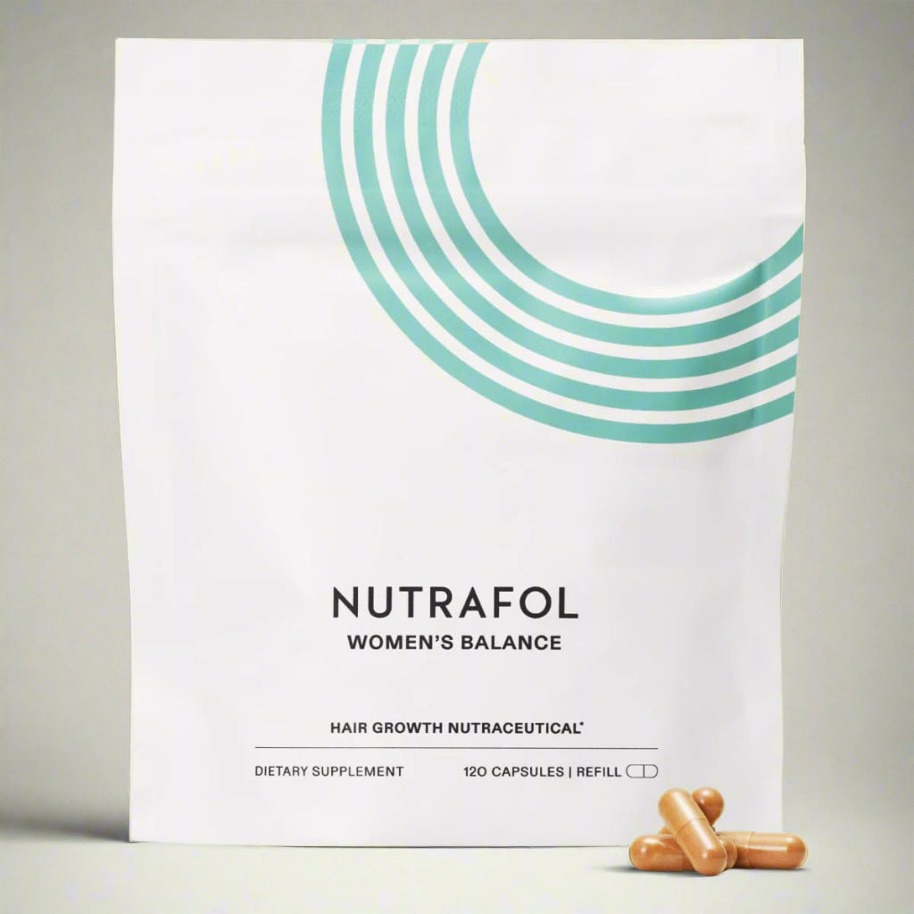Nutrafol Women's Balance hair growth supplement packaging on a pastel background