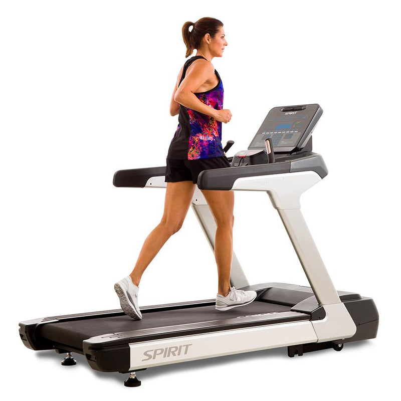 Female athlete light jogging on the Spirit CT900 treadmill.