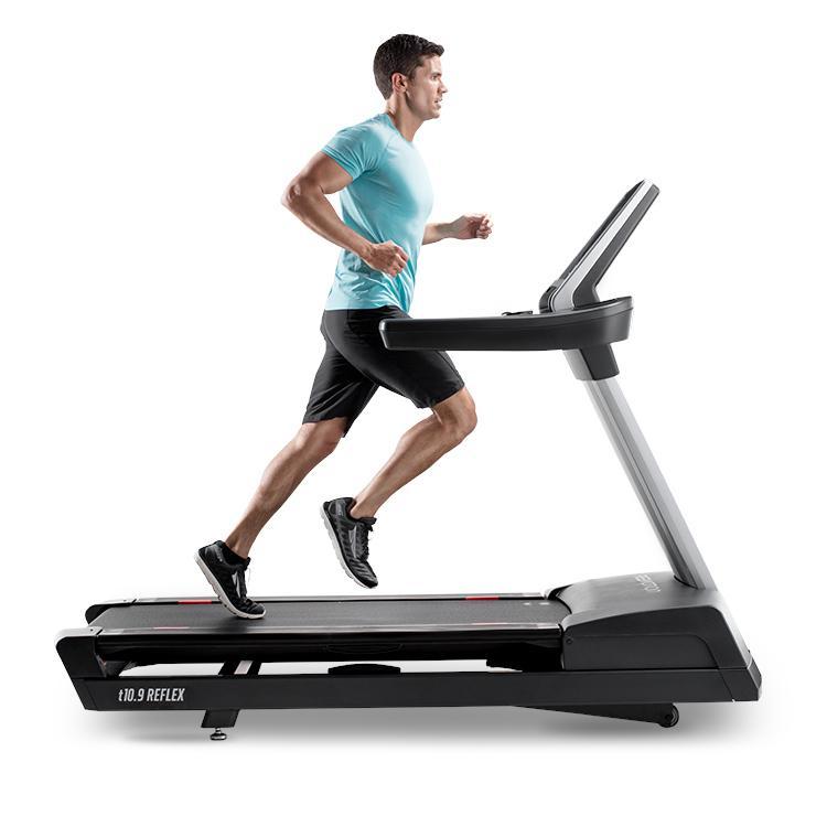 Man Jogging on the FreeMotion t10.9 Interval REFLEX™ Treadmill.