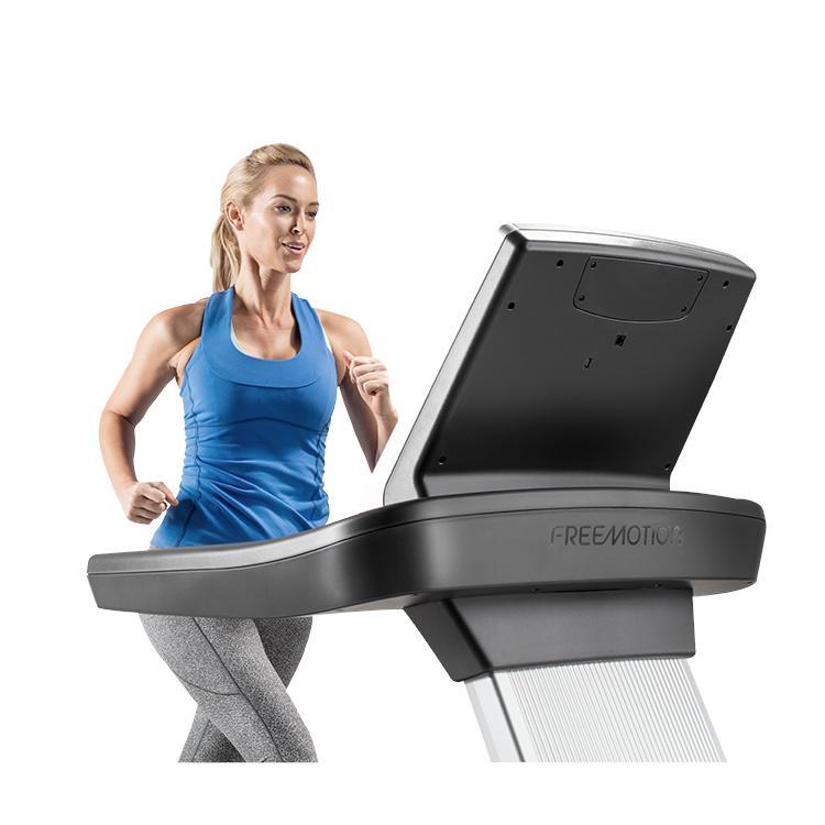 Woman Running on the FreeMotion t10.9 Interval REFLEX™ Treadmill.