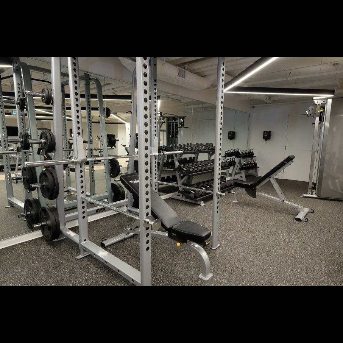 Inflight Fitness FID Adjustable Multi-Bench with a Power Rack.