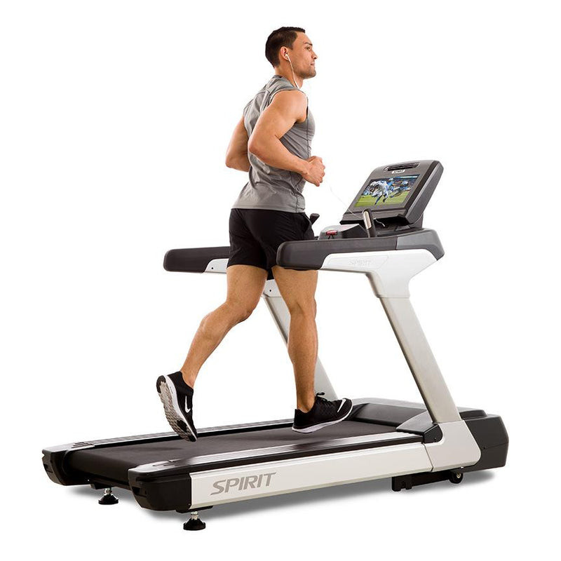 Male athlete light jogging on the Spirit Fitness CT900ENT treadmill.