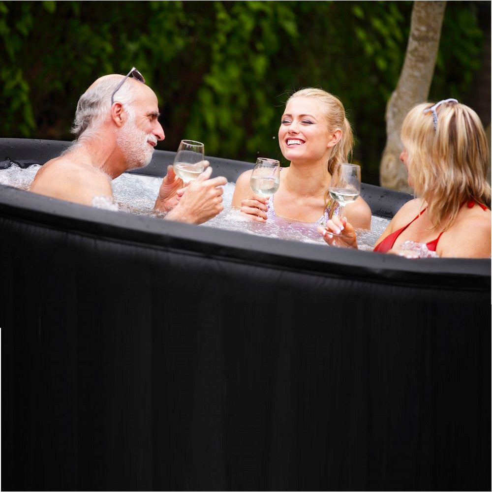Pro6 M-SPA Mont Blanc Inflatable 4 Person Hot Tub - in use with 3 people.