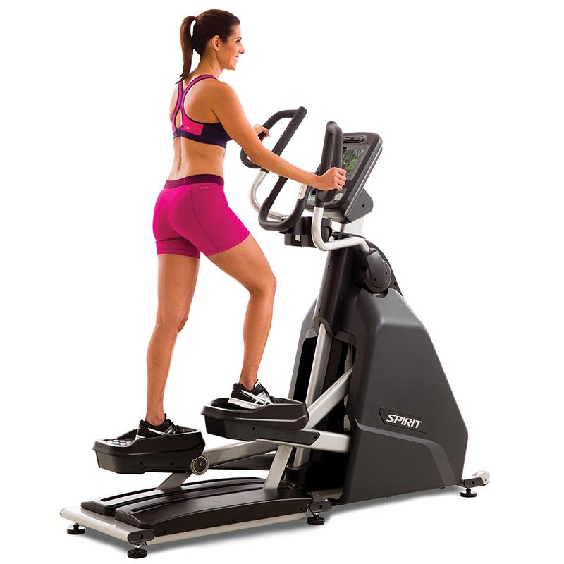 Spirit Fitness CE900ENT Elliptical with female.