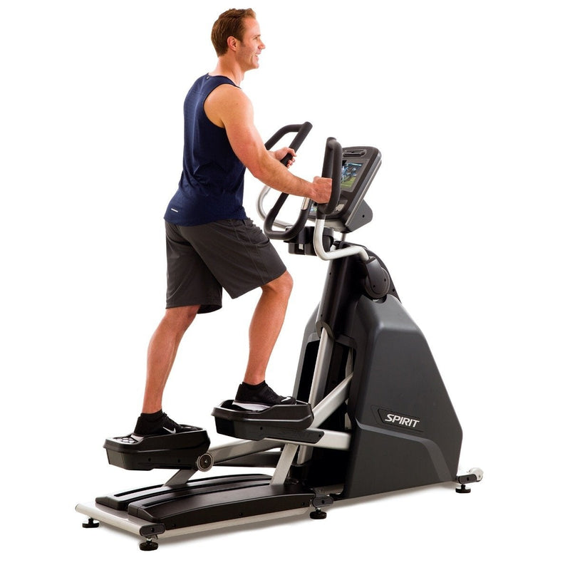 Spirit Fitness CE900ENT Elliptical with male.